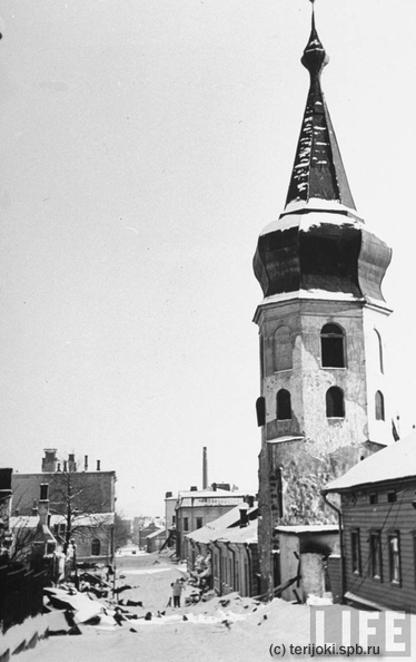 Выборгская ул. (Luostarinkatu), башня Ратуши. - Выборгская ул. (Luostarinkatu), башня Ратуши.
Buildings showing damage after Russian bombing raid.
Location: Viipuri, Finland
Date taken: 1940
Photographer: Carl Mydans
(c) Time Inc c76.jpg